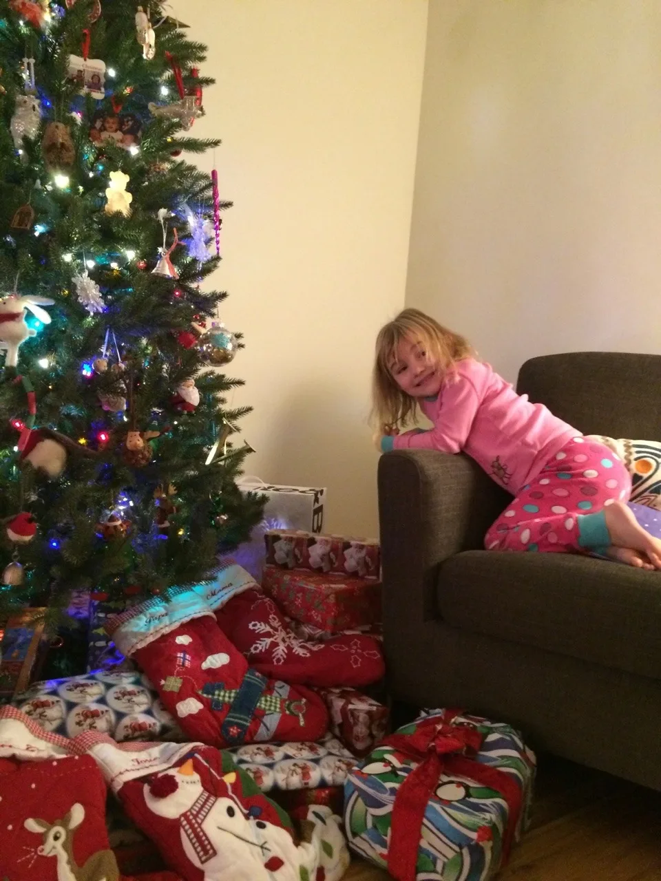 “These look just like our labels!” And John thought I was being silly for insisting we buy new wrapping paper for Santa’s presents instead of using what we already had. She’s so observant!