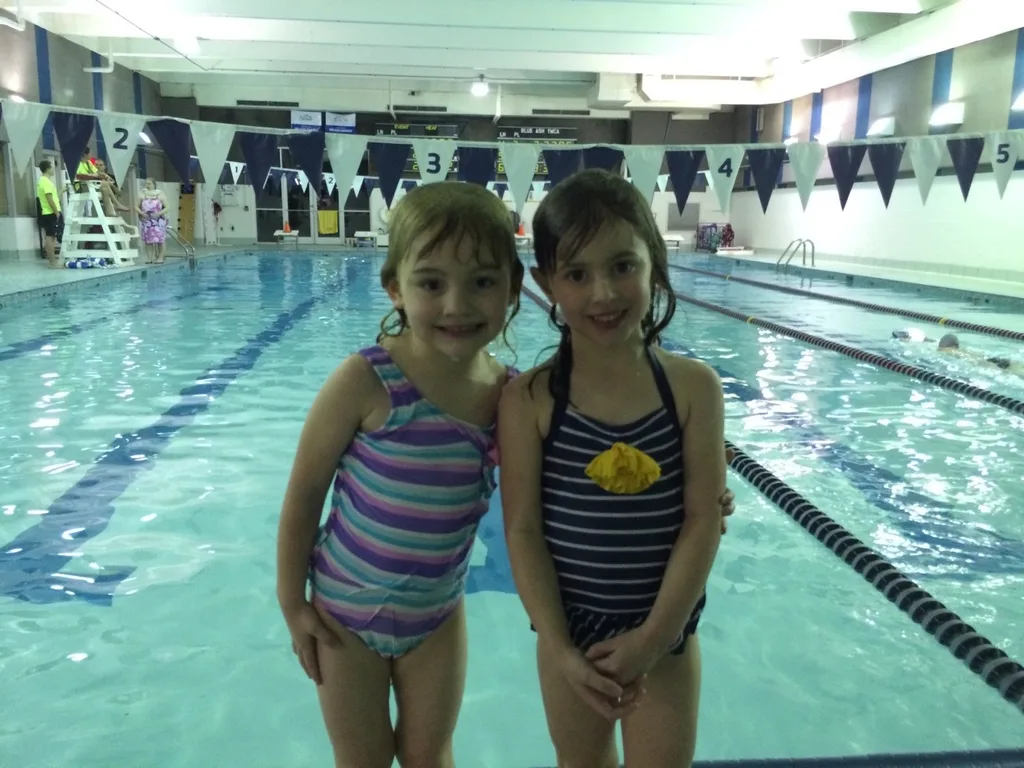 Abby was thrilled to be swimming with her buddy Norah again.