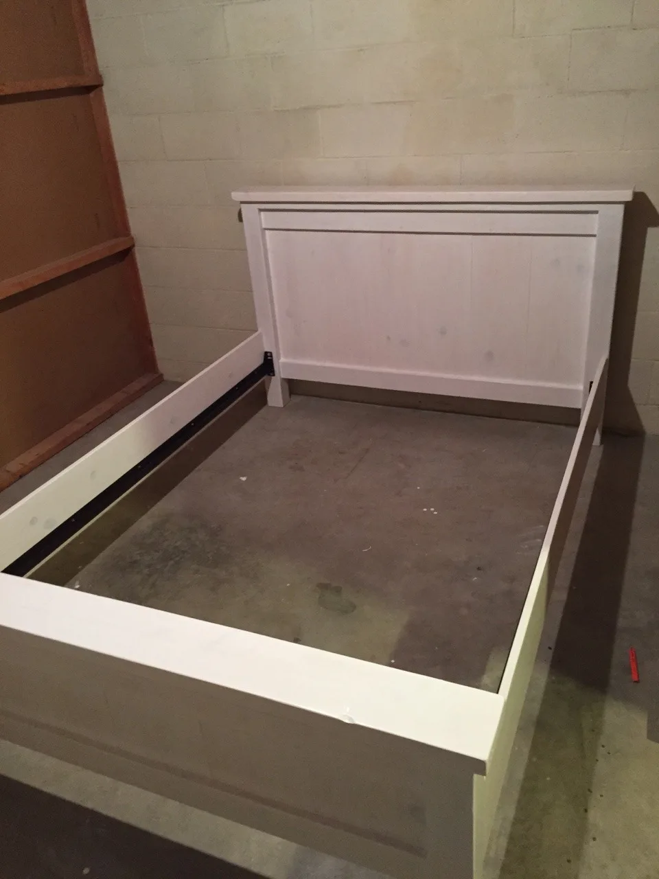 That took longer than I expected.

After two and a half months (and a herniated disc), we have a bed. We like it, and so do our bouncing girls.