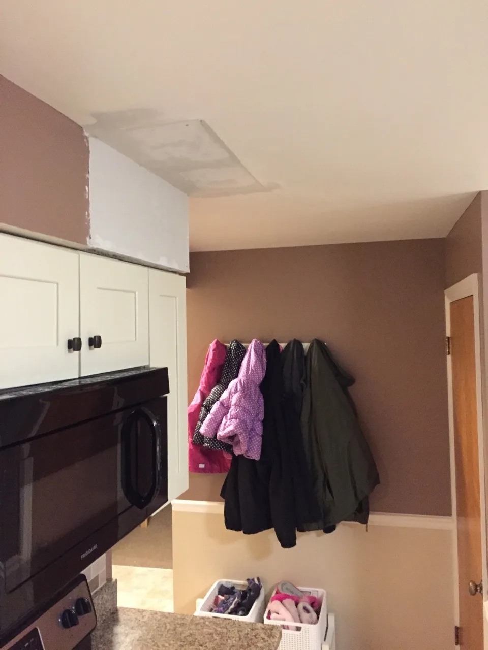 The inexplicable (vestigial?) soffit is gone! Next up is repainting the kitchen.