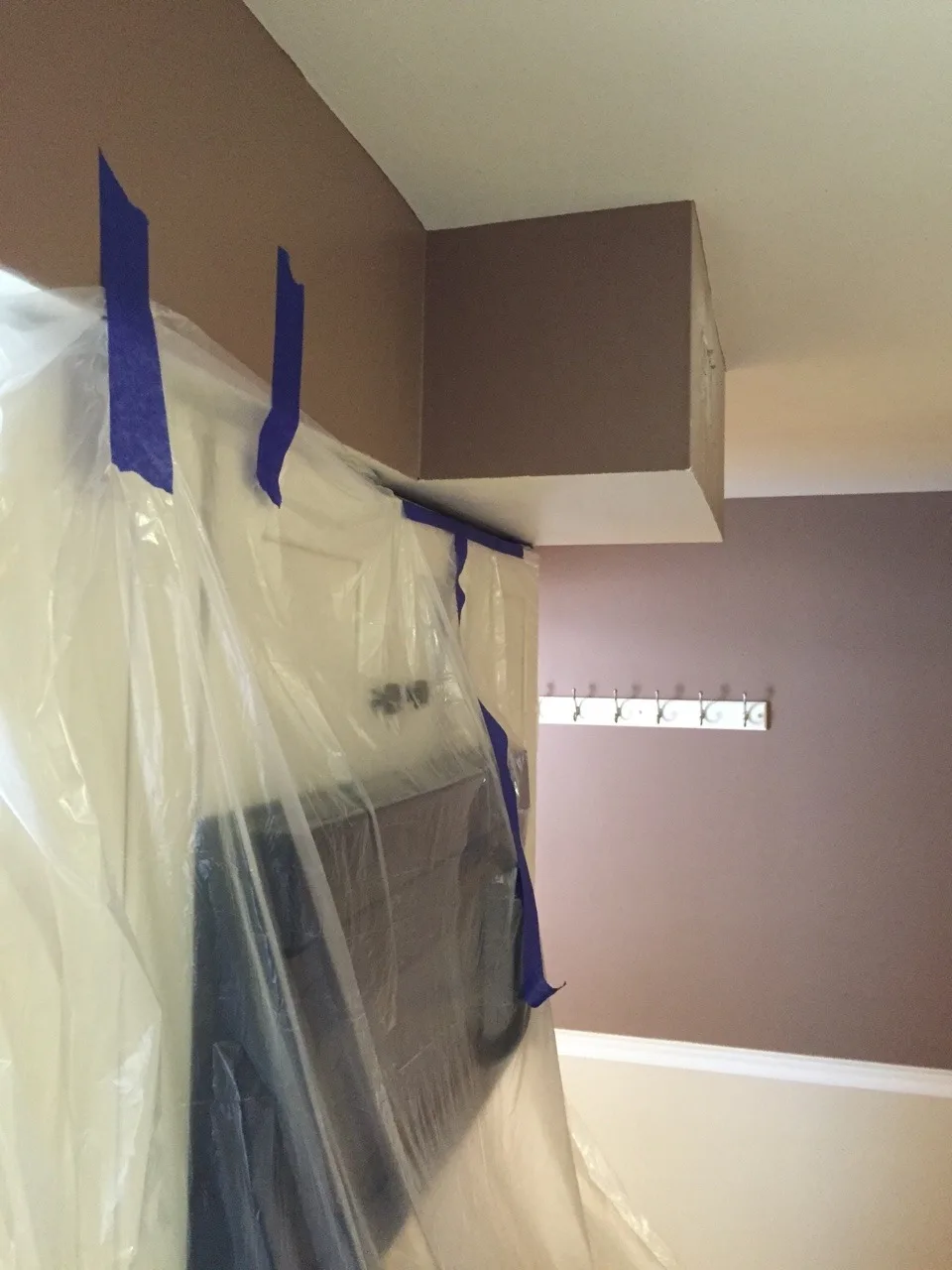 The inexplicable (vestigial?) soffit is gone! Next up is repainting the kitchen.