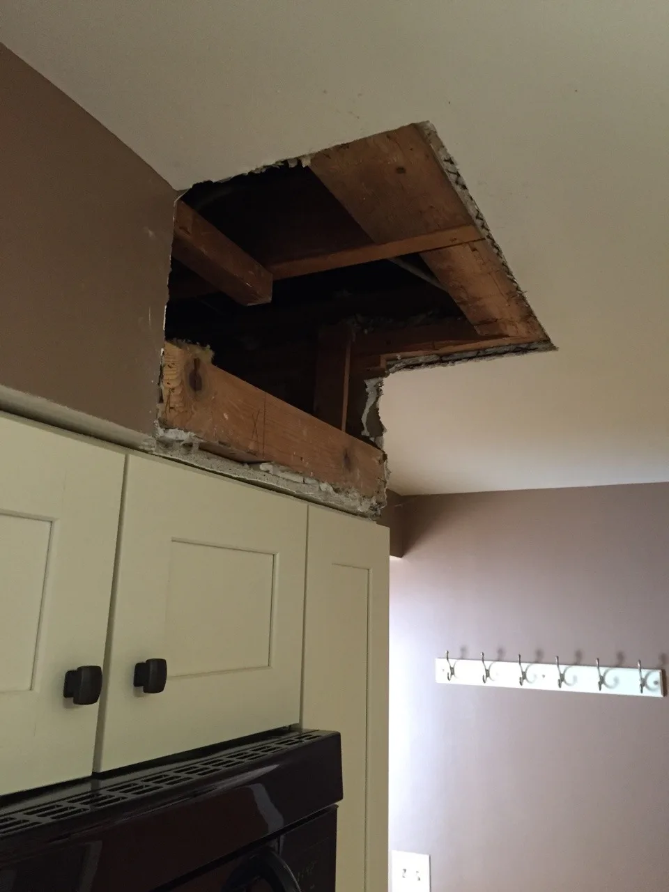 The inexplicable (vestigial?) soffit is gone! Next up is repainting the kitchen.