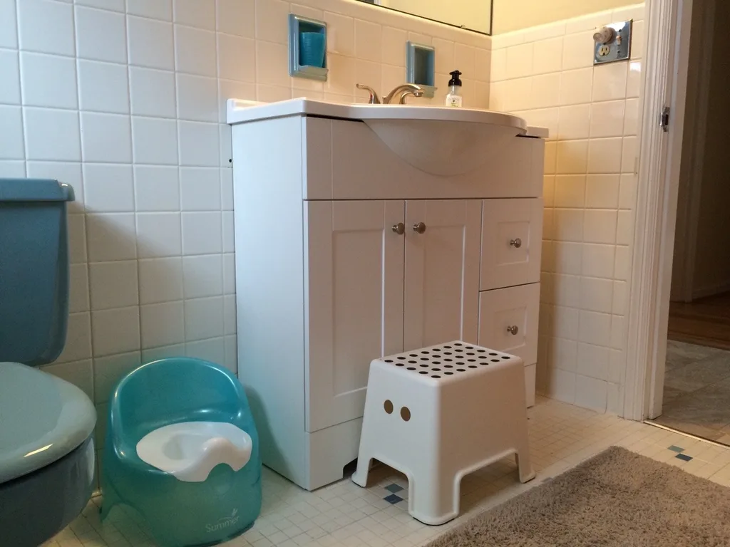 Since we didn’t want to expose our sick kids to paint fumes this weekend, we decided to tackle another project. The bathroom seems so much bigger and nicer now!