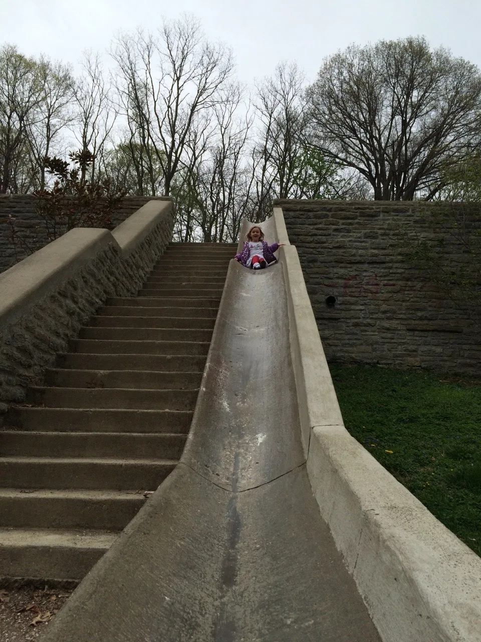 Mark this off the childhood must do list: riding the slide at Burnet Woods. Abby loved it!