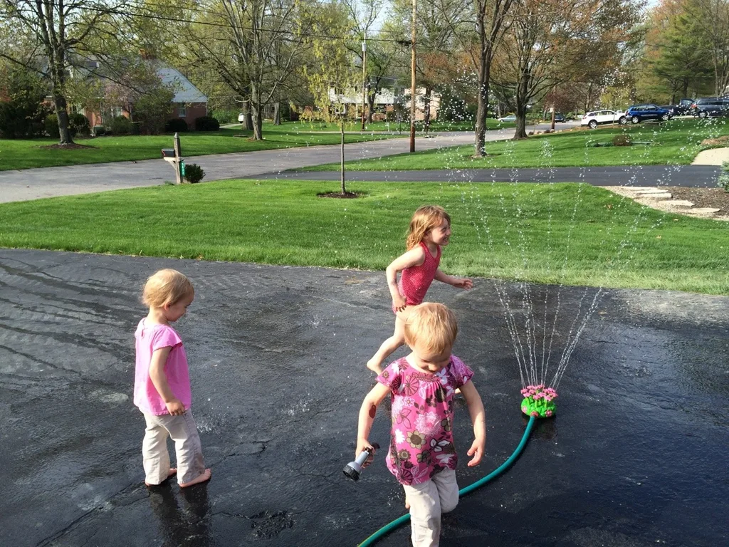 Enjoying a Peanut Butter and Jam concert with friends and splashing around in a sprinkler = a pretty good day!