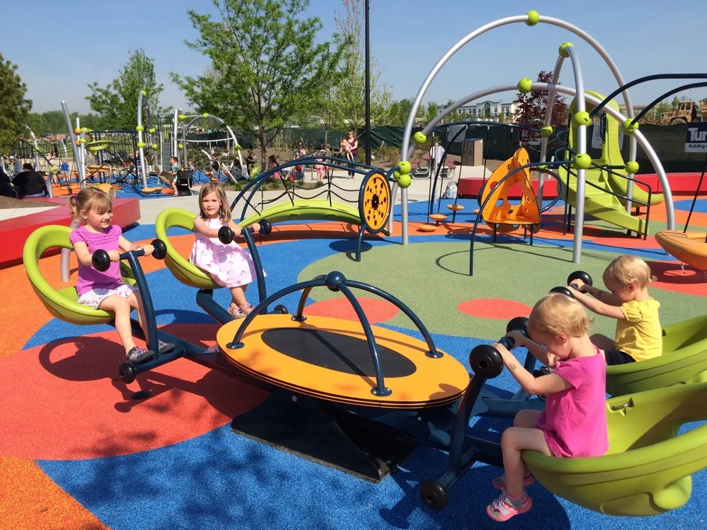 It felt like summer today! We got all hot and sweaty with a Madeira Moms playgroup at the new Blue Ash Summit Park. The girls enjoying playing on the awesome (albeit sun-drenched) play structure, swinging on the over-sized porch swings, and doing “tricks” on the great lawn. They capped off the fun by cooling off in their backyard pool. I hope they take great naps because all that sun and excitement sure wore me out!