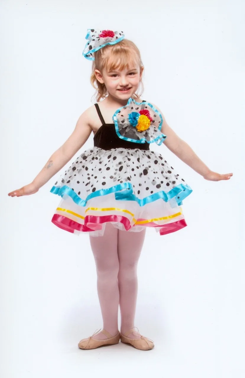 I can’t believe we almost missed out on seeing these faces by skipping picture day! The group dance class photo makes me smile every time I look at it. I just love the expressions! And, gosh, Abby sure is cute!