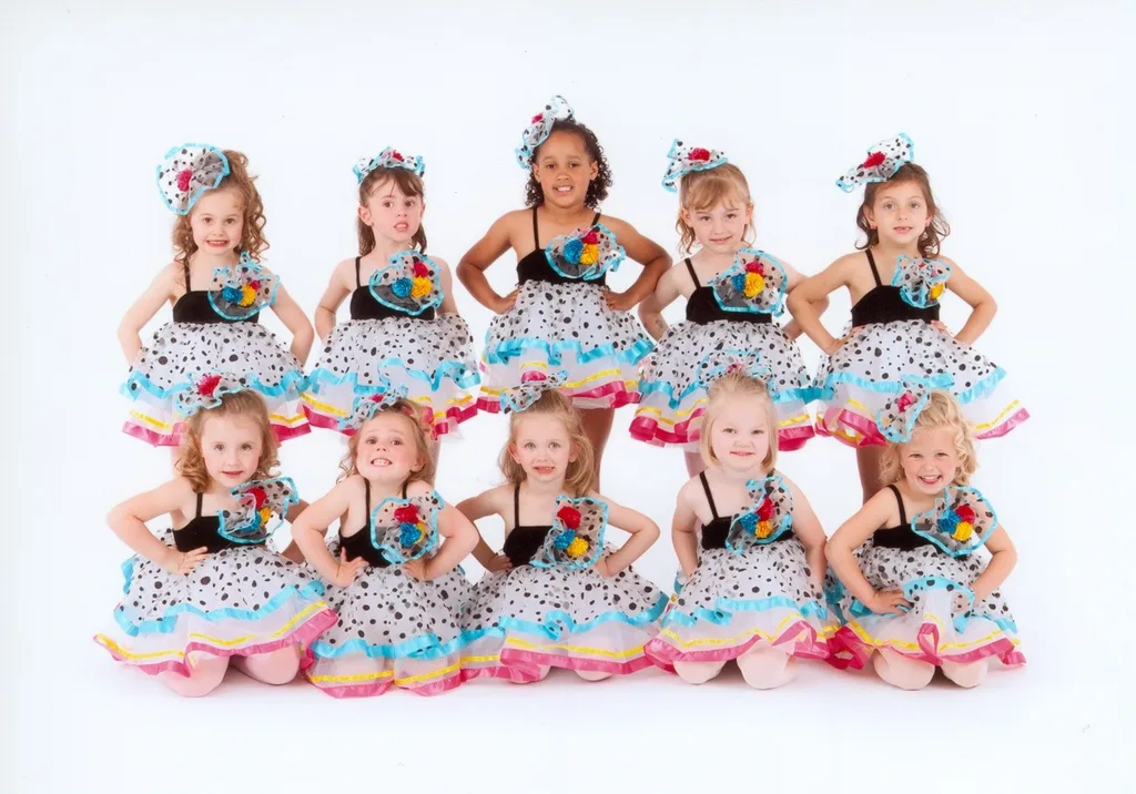 I can’t believe we almost missed out on seeing these faces by skipping picture day! The group dance class photo makes me smile every time I look at it. I just love the expressions! And, gosh, Abby sure is cute!