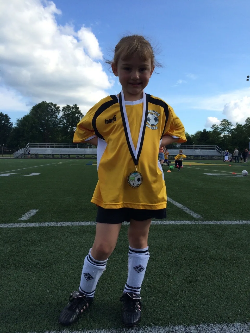 A medal of accomplishment for the last soccer game of the season.