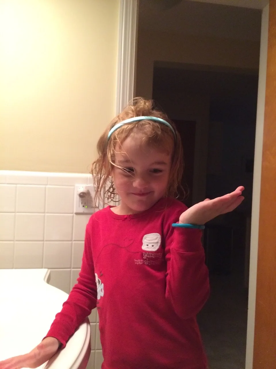 “Stylish for bedtime,” she said. Good thing this silly goose sometimes allows me to brush her hair.