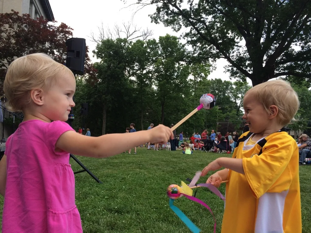 We enjoyed the music of the Comet Bluegrass All-stars and some art-making at the Clifton Cultural Arts Center tonight. Gwen and Josie thought the comet wands they made were perfect for sibling whacking.