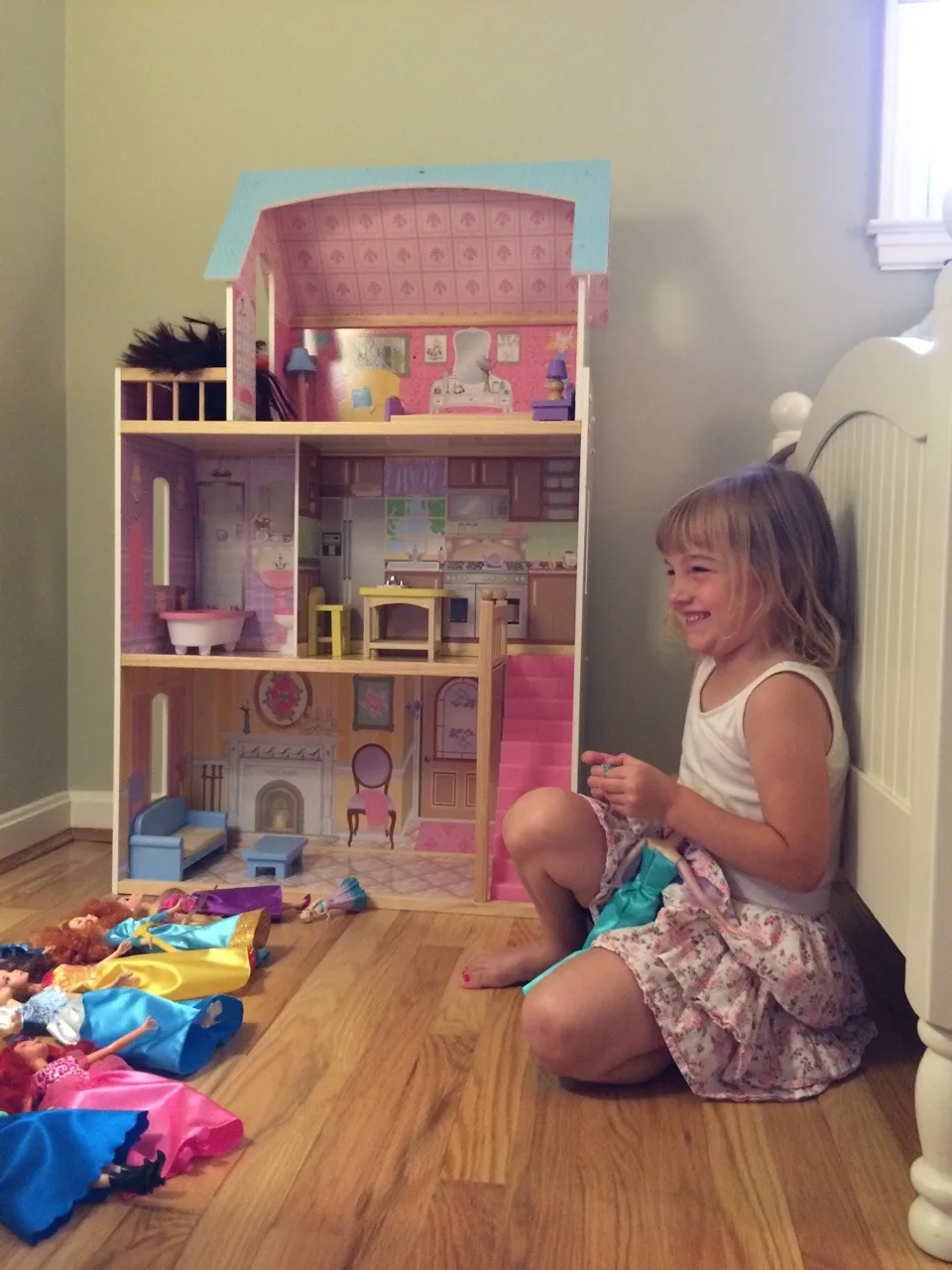 Abby loved playing with her new dolls and dollhouse today, but would like to give back the cold. We both agree that it was a crummy fifth birthday present.
