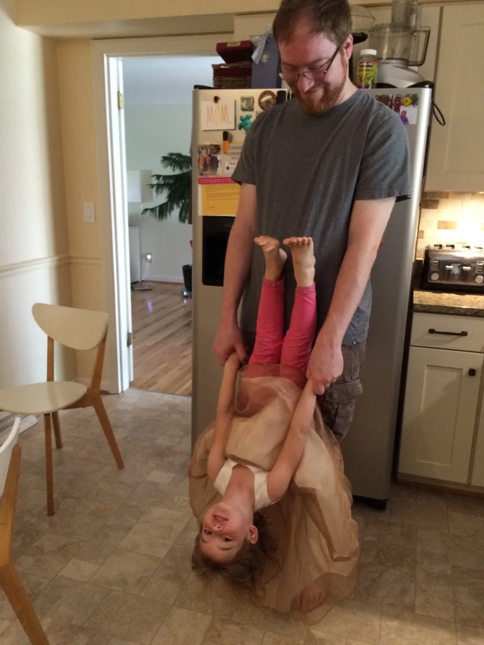 Happy Father’s Day to a wonderful, Papa!  
“Can I help?”  
“Papa, flip me over.”  
Playful parenting is one of his many talents. What lucky girls!
