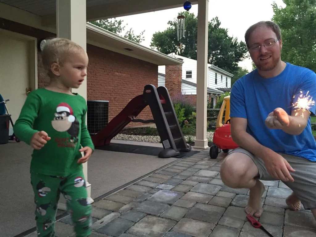 The girls were huge fans of the sparklers, but Gwen did not, no way, want to hold hers.
