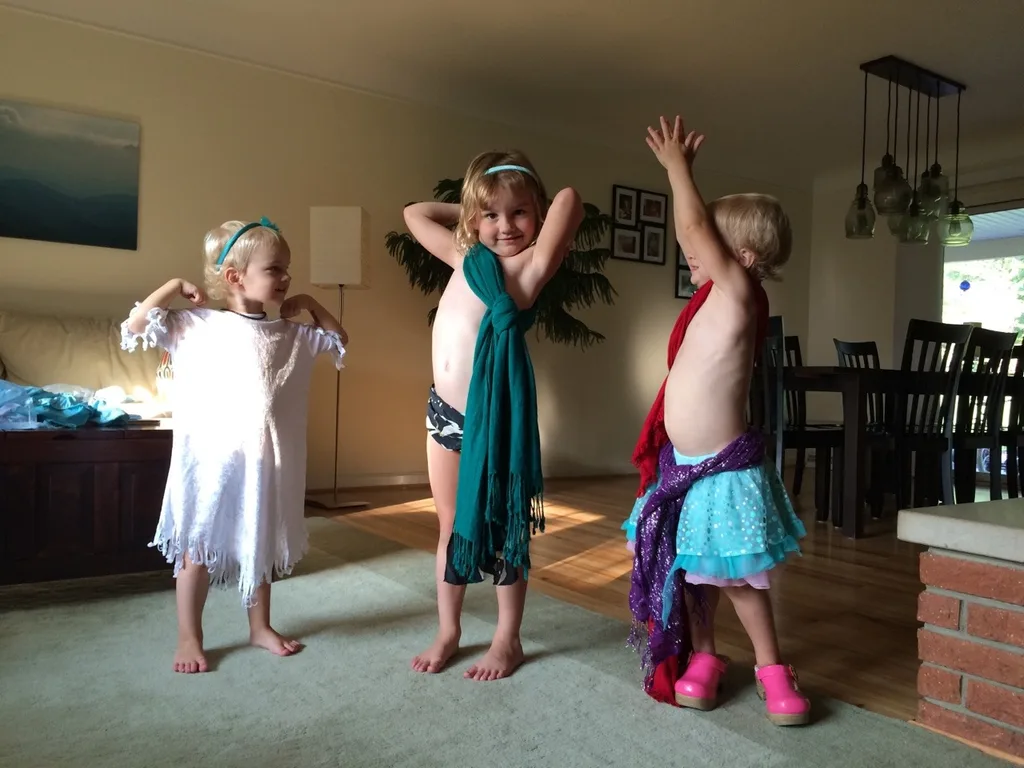 I have no idea where the idea came from, but Abby designed these outfits because they’re “tough army girls.”