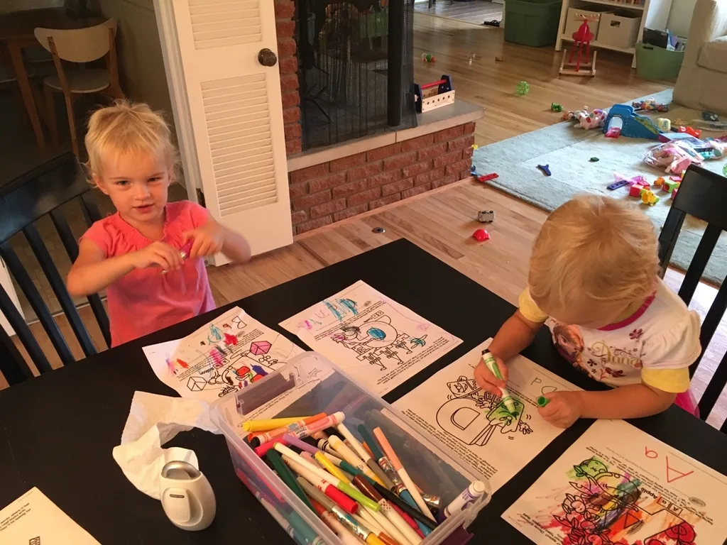 Fun activities for a rainy morning: playing dress-up, reading the dictionary, reviewing recipes, helping to make pumpkin bread, and coloring.
