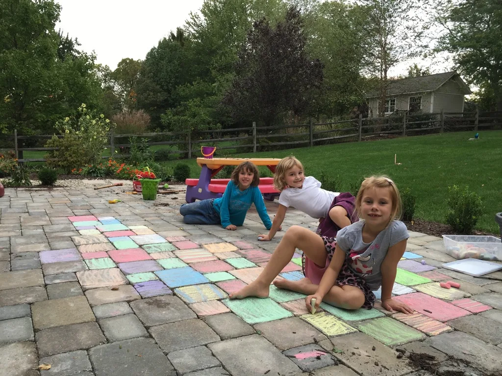 After making “soup,” they started decorating for their “wedding party.” I loved witnessing the creativity and friendship, and was happy they took a break from their art so I could capture the moment.