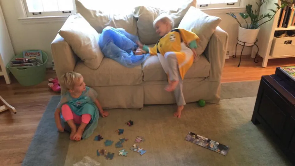 Gwen and Josie decided to work on puzzles today. They each picked one out, pulled the puzzle pieces out of the bags, and got to work. Josie lost interest two seconds later, but Puzzle Master Gwen quickly finished her puzzle by herself and got out another. With some things they are definitely very different little people!