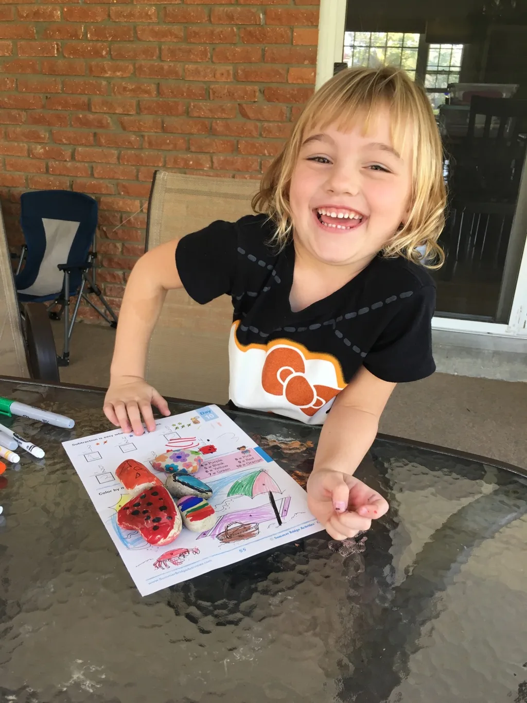 Like Ladybug Girl, Abby enjoys decorating rocks.