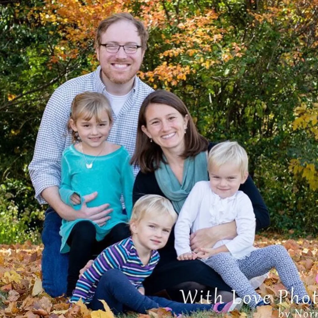 Although Josie fairly quickly stopped being cooperative, the photographer did manage to capture one really nice picture for our very first family photo. I like it!