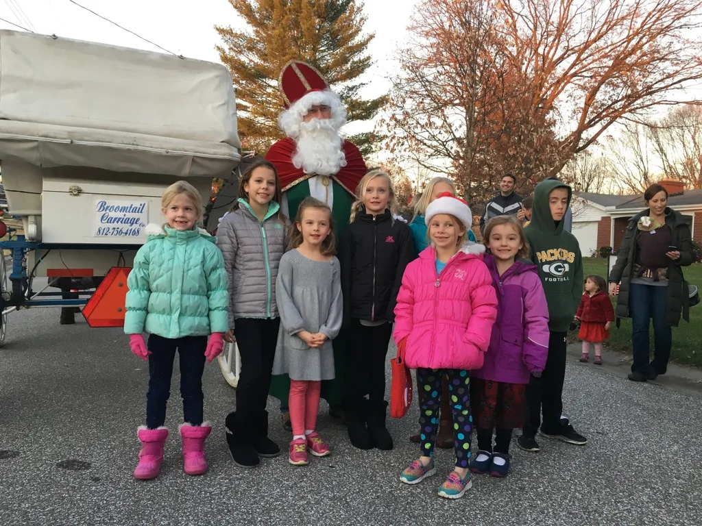 What a great day! It started with craft fun at the Madeira Moms kids holiday party. Free carriage rides through the business district, and free hot chocolate by a fire followed that. St. Nicolas later delivered treat bags to all the kids in the neighborhood. And now, as I type this, all three of our girls are playing at a friend’s house. Gosh, I love living in Madeira!