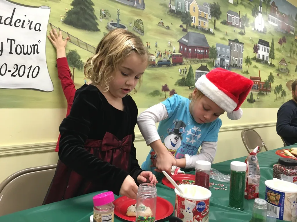 What a great day! It started with craft fun at the Madeira Moms kids holiday party. Free carriage rides through the business district, and free hot chocolate by a fire followed that. St. Nicolas later delivered treat bags to all the kids in the neighborhood. And now, as I type this, all three of our girls are playing at a friend’s house. Gosh, I love living in Madeira!