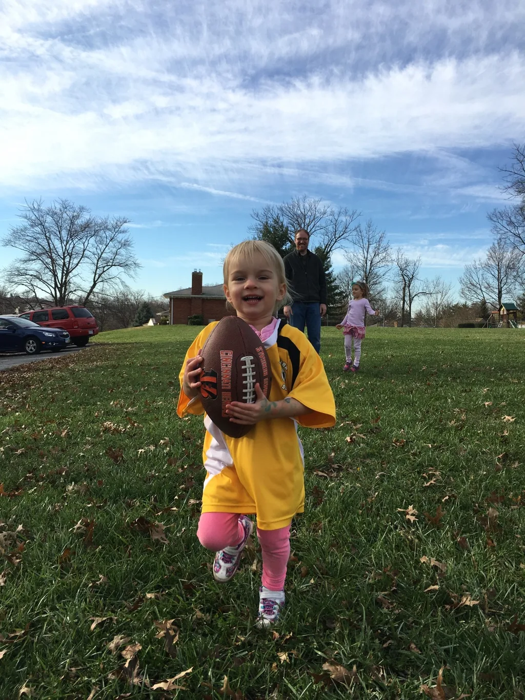 Gwen finally got a chance to play football! We all had a great time at the annual Speed Family football game today. The weather was perfect, and the party afterwards was fun. Why did it take me 24 years to finally attend one?