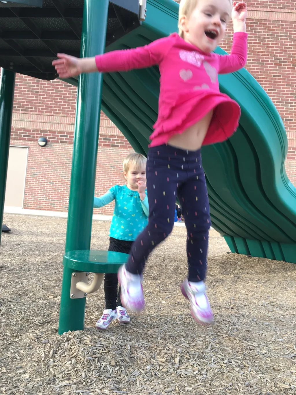 While Abby had soccer practice on the field nearby, Gwen and Josie enjoyed the big kid playground at MES. They also insisted I take pictures of their “tricks.”
