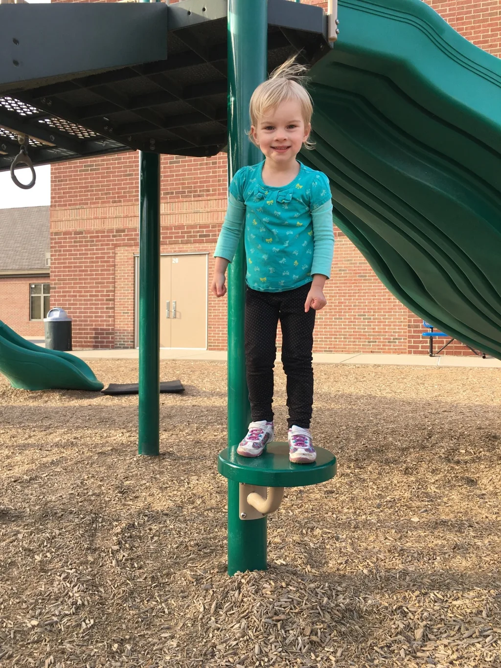 While Abby had soccer practice on the field nearby, Gwen and Josie enjoyed the big kid playground at MES. They also insisted I take pictures of their “tricks.”