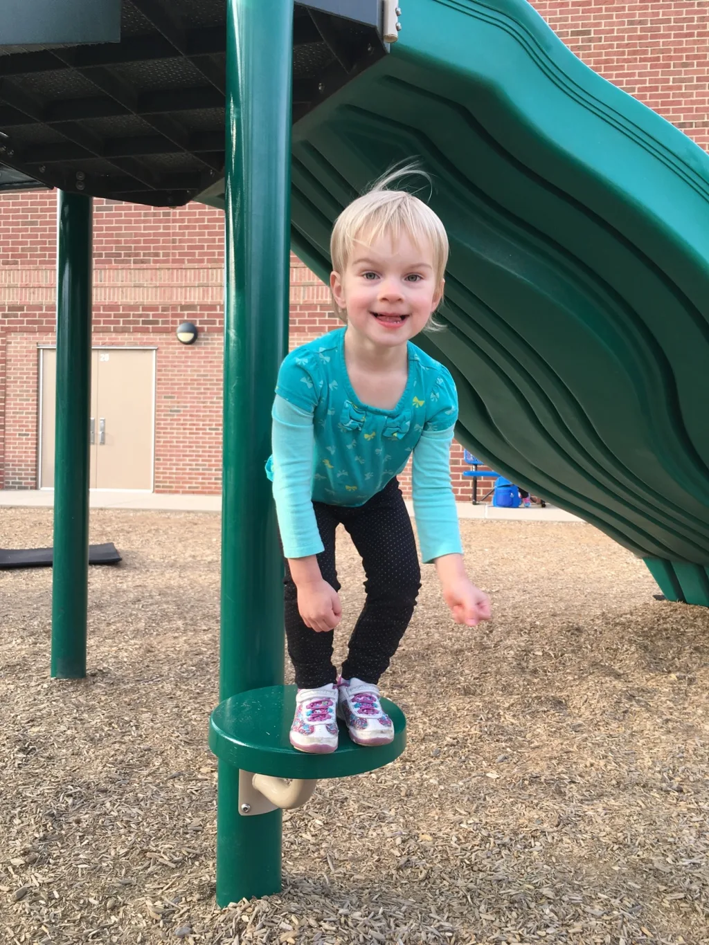While Abby had soccer practice on the field nearby, Gwen and Josie enjoyed the big kid playground at MES. They also insisted I take pictures of their “tricks.”