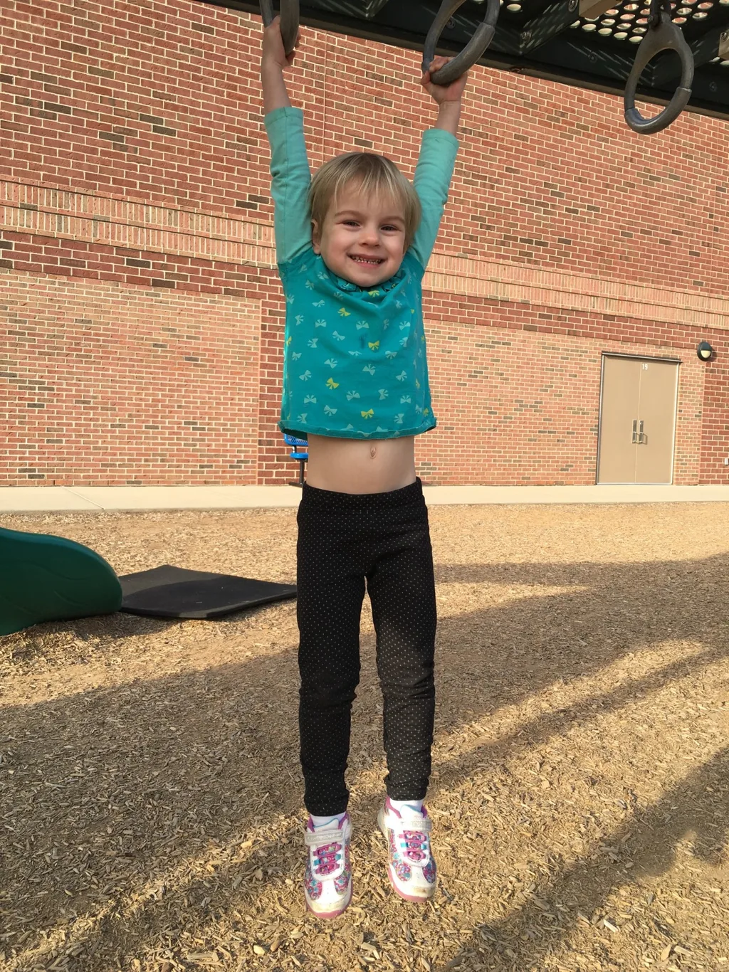 While Abby had soccer practice on the field nearby, Gwen and Josie enjoyed the big kid playground at MES. They also insisted I take pictures of their “tricks.”