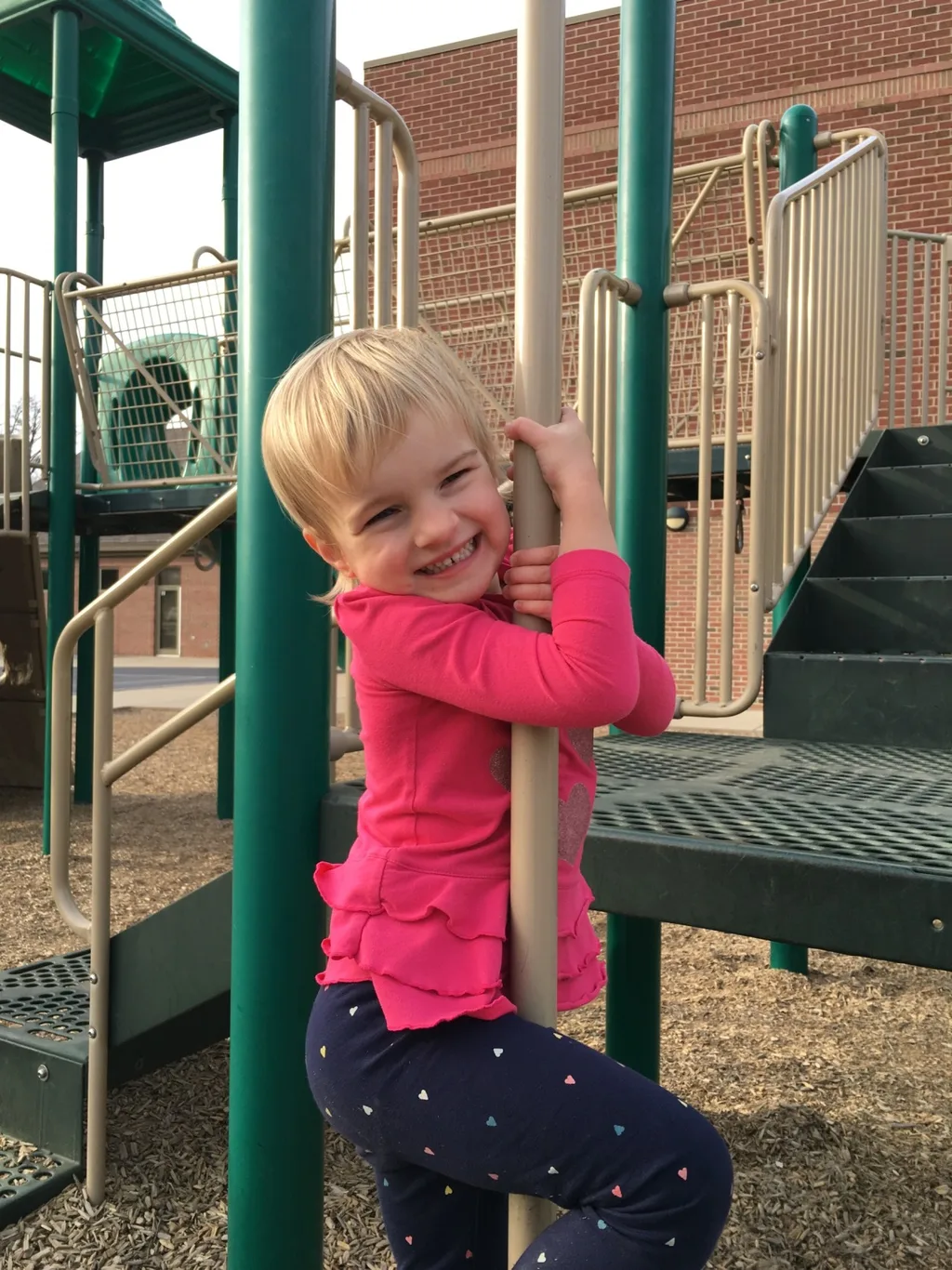 While Abby had soccer practice on the field nearby, Gwen and Josie enjoyed the big kid playground at MES. They also insisted I take pictures of their “tricks.”