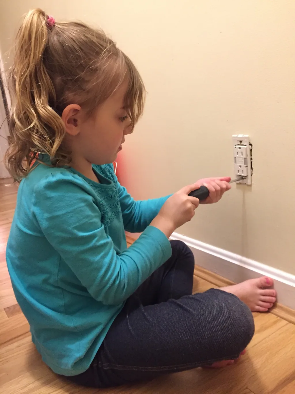 First she wanted me to teach her to sew on a button, and then she decided to help her Papa. Abby is a curious girl with many talents!