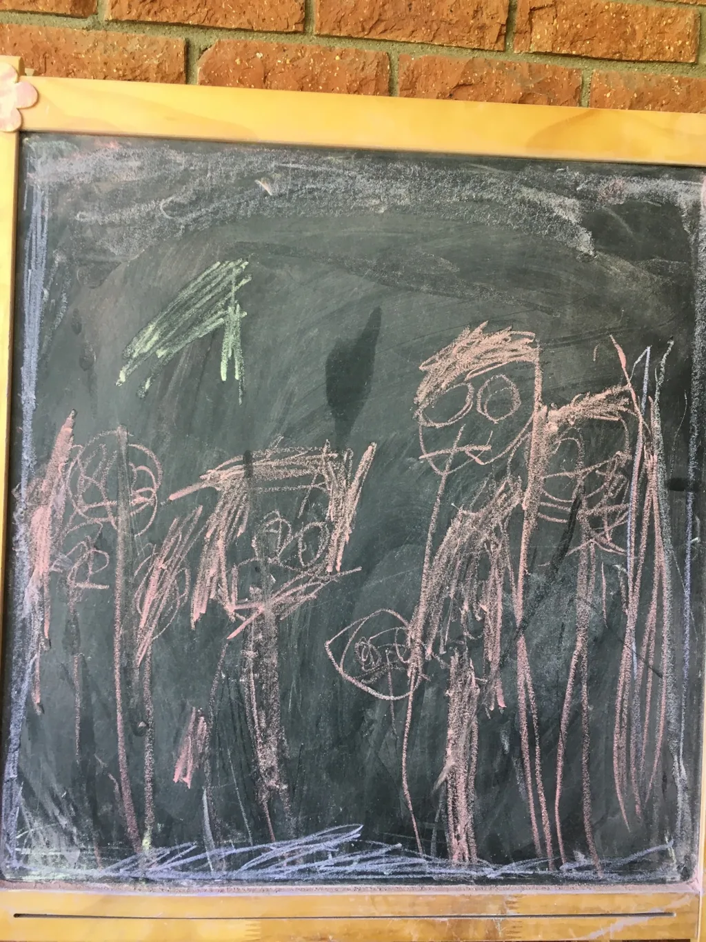 Josie’s drawing of our family. John asked when she learned how to draw people. “In November,” she said.
