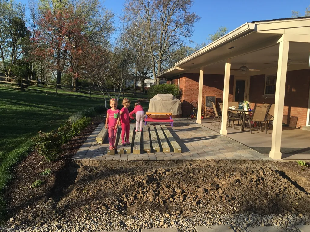 Building our DIY raised garden bed begins! We rented a Home Depot truck last night (just $19!) and hauled all the wood (12 foot timbers!), soil, compost, pea gravel, etc home. We’re all super excited.