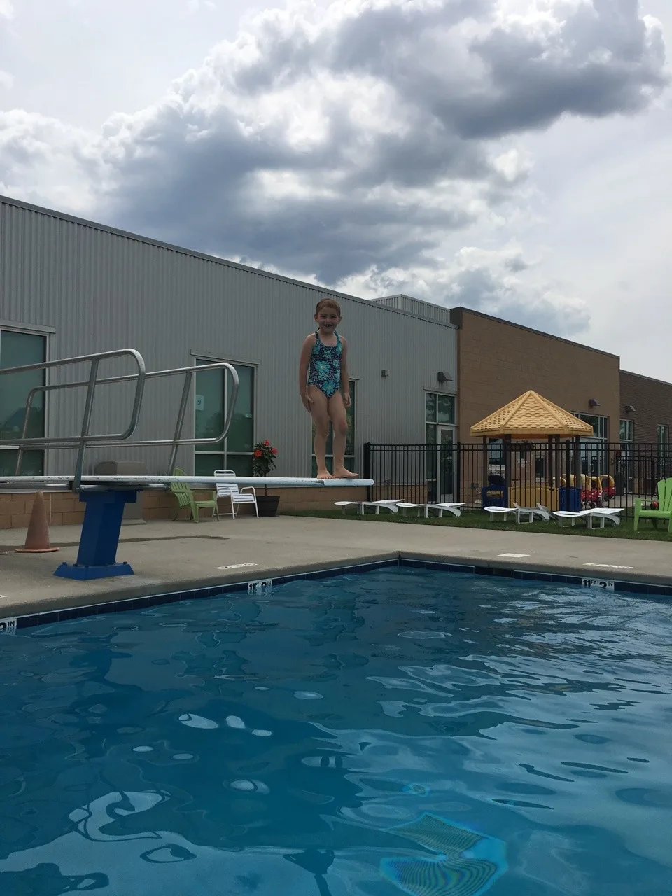 Someone’s list of summer accomplishments keeps growing. First she learned to ride a two-wheeler, then she passed the deep water test at the KHCC pool, and now today she not only passed the deep water test at the JCC, but she also mastered the diving boards! And it’s only week 1 of summer break!