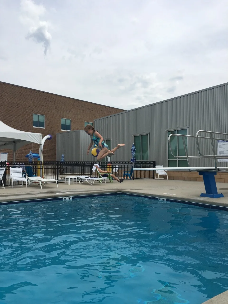 Someone’s list of summer accomplishments keeps growing. First she learned to ride a two-wheeler, then she passed the deep water test at the KHCC pool, and now today she not only passed the deep water test at the JCC, but she also mastered the diving boards! And it’s only week 1 of summer break!