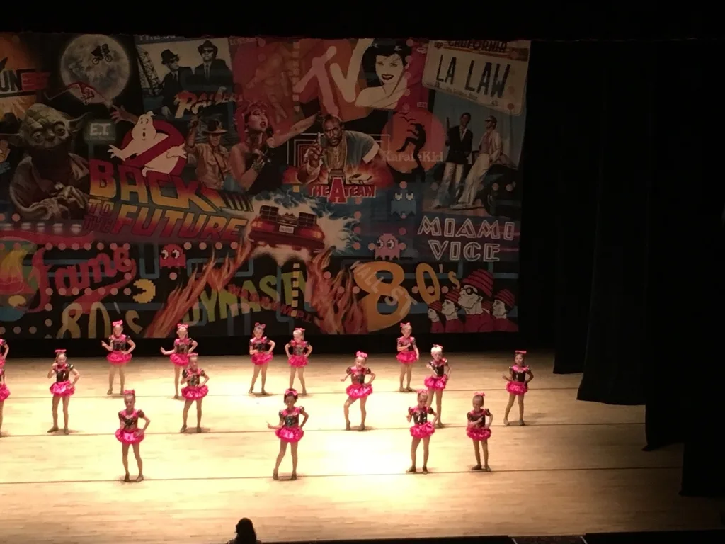 Abby was all smiles and did a wonderful job at her “Totally 80’s” dance recital!