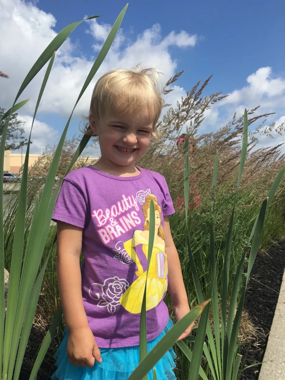 These silly girls wanted their pictures taken in the tall grass near Costco! I guess they can appreciate something pretty in nature wherever they find it.
