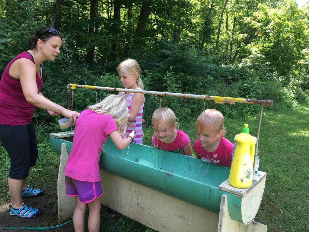 Day four of Girl Scout camp was filled with outdoor art, and science experiments – sun transfers, painting, nature photography, gloop, coke rockets, dancing raisins, static electricity, homemade sorbet. The girls also played a much needed, long game of “drip, drip, drench.”