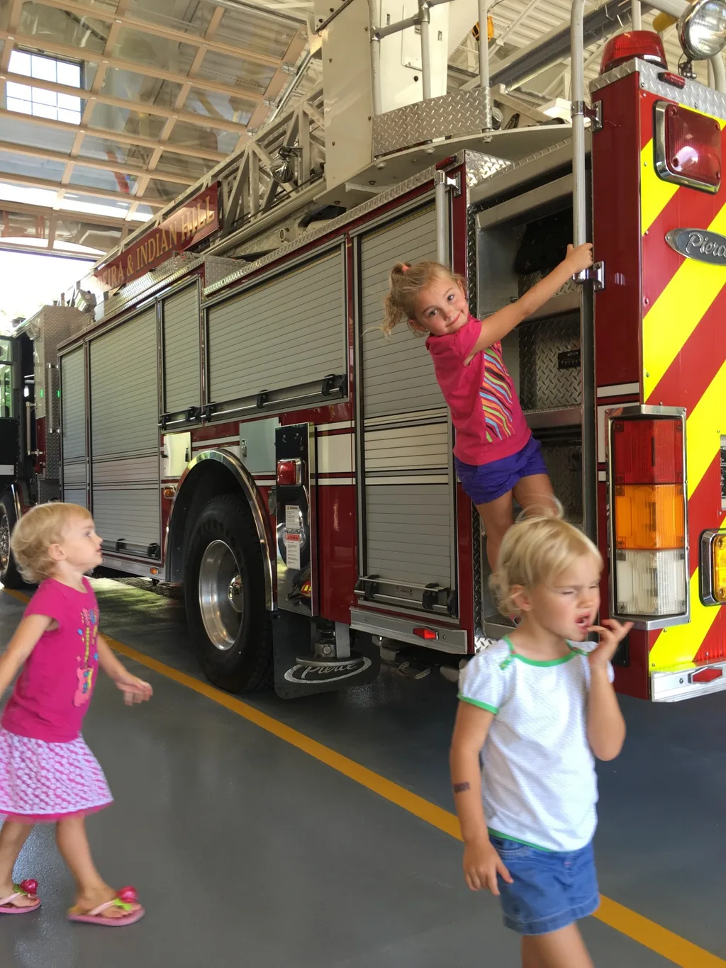 The new fire station is nice, but being able to climb on the trucks was definitely the highlight for kids at the open house today.