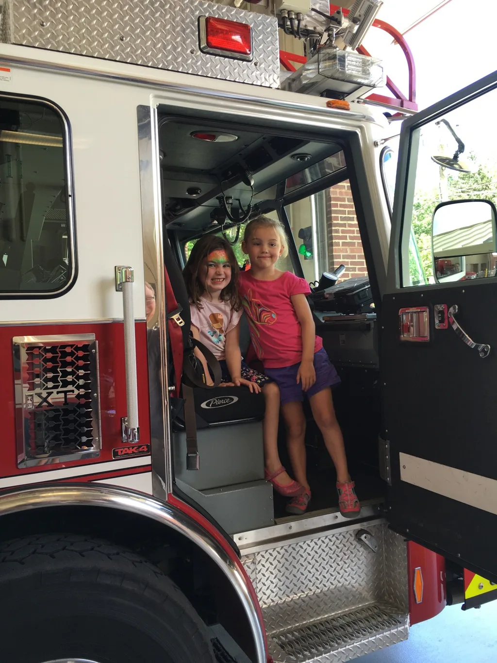The new fire station is nice, but being able to climb on the trucks was definitely the highlight for kids at the open house today.