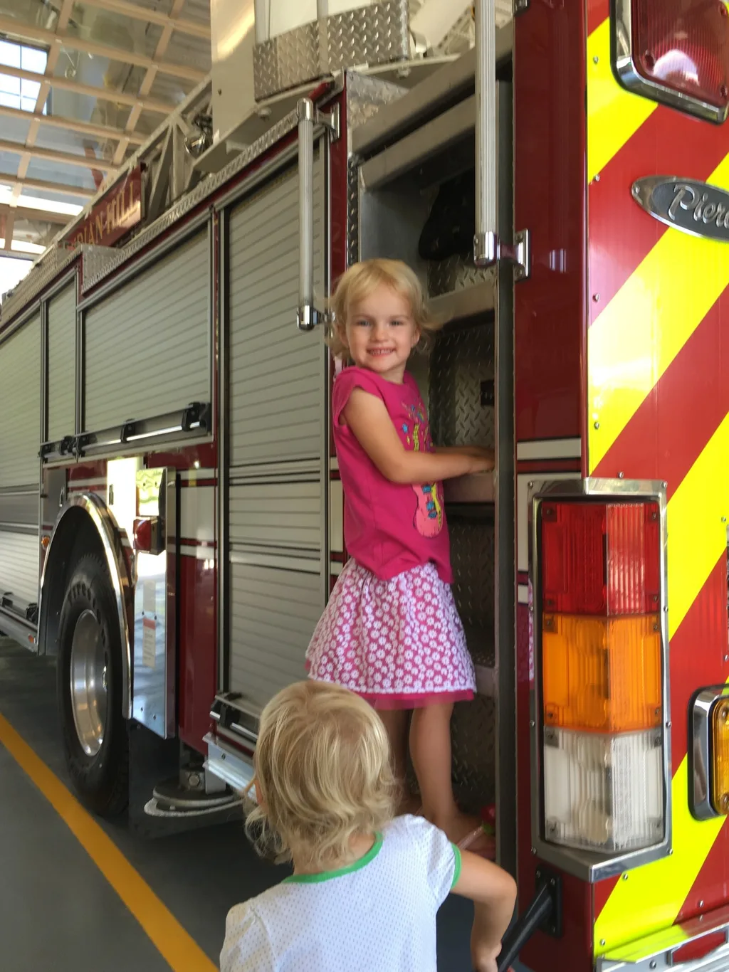 The new fire station is nice, but being able to climb on the trucks was definitely the highlight for kids at the open house today.