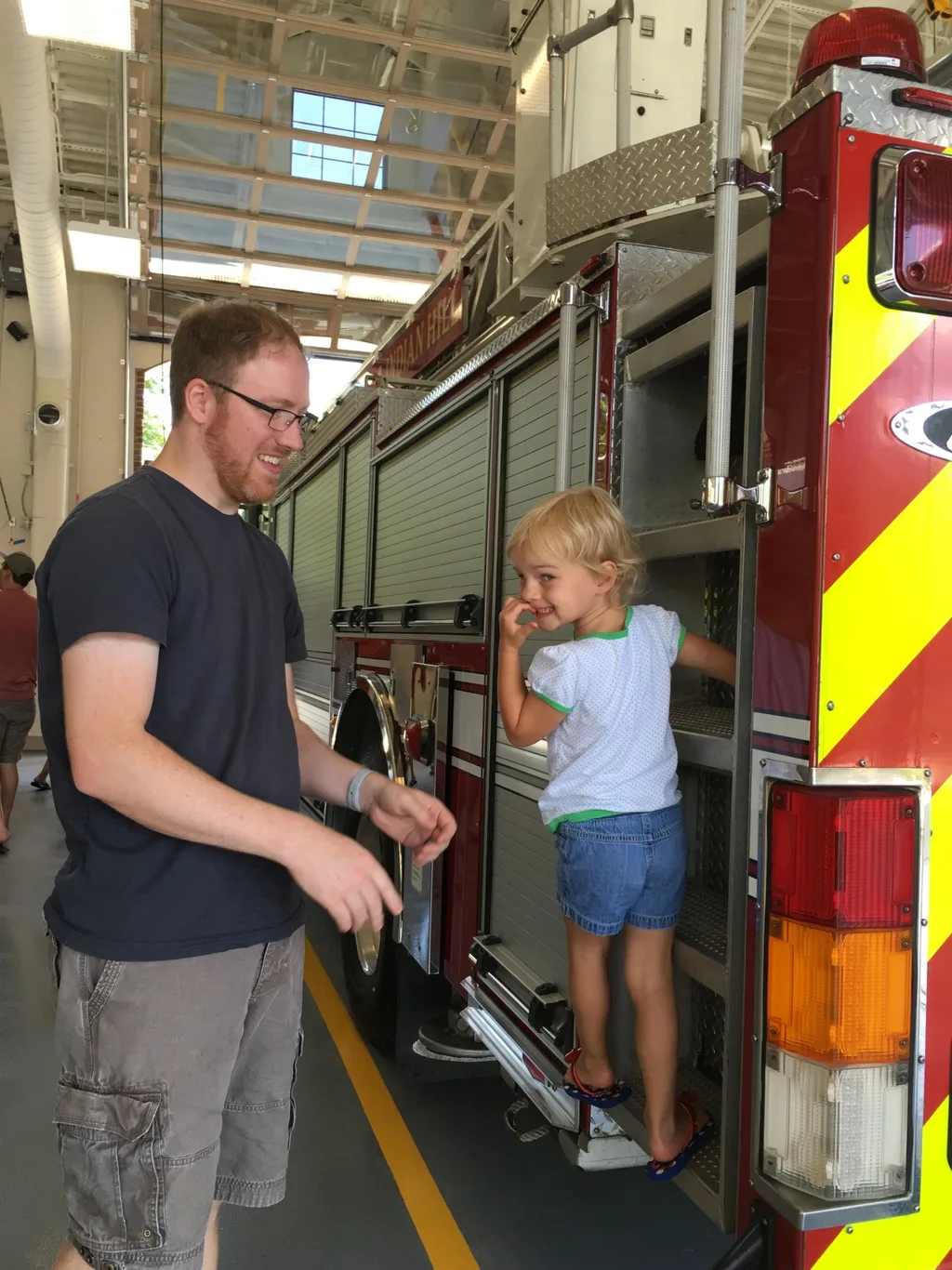 The new fire station is nice, but being able to climb on the trucks was definitely the highlight for kids at the open house today.
