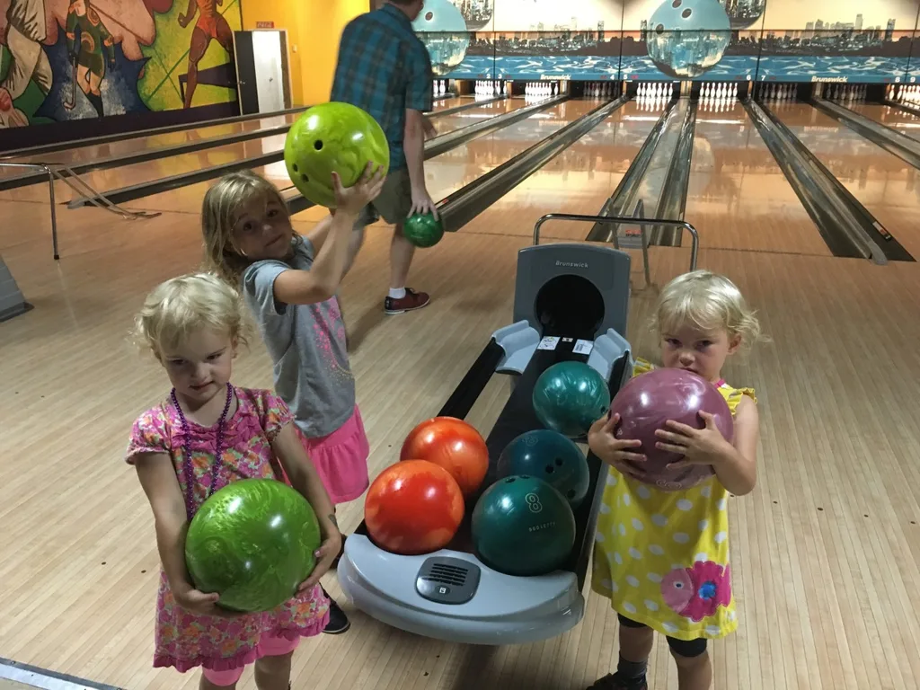 Vacation day 2: some driving, swimming, bowling, eating, ands lots of hugging. The girls were thrilled to see their Auntie Em.
