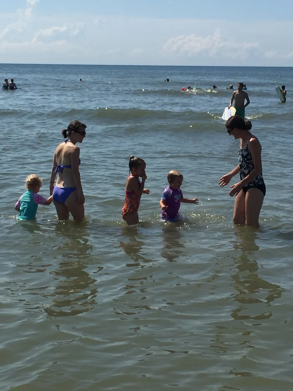 Vacation day 3: We had a blast playing at the beach on Hilton Head Island. It was their first time at the ocean, and Gwen and Josie loved it! Gwen especially liked crashing into the waves. Abby and Josie really liked playing in the sand.