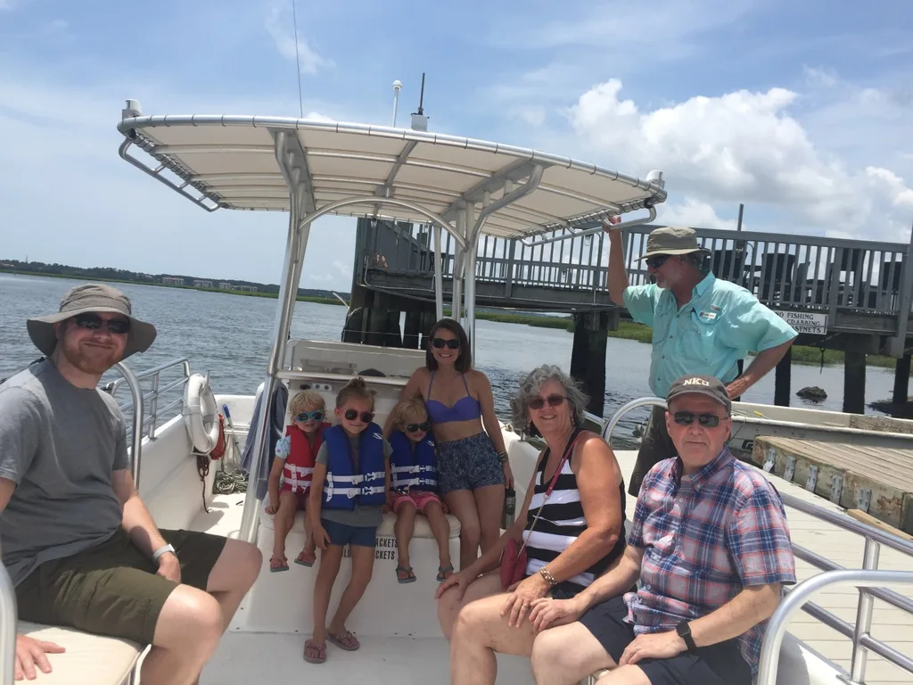 Vacation day 5: Dolphins and sharks were the highlights of our day! Mom and Tim joined us for a wonderful dolphin tour, and a surprise evacuation from the water at Coligny beach due to sharks!