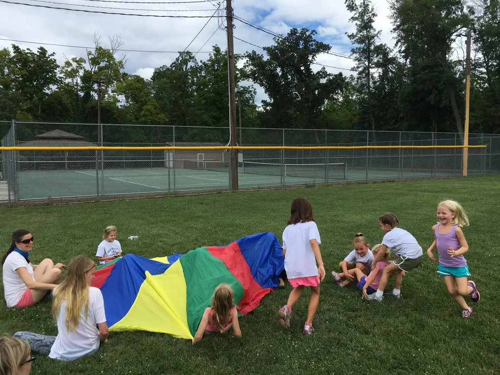 I planned a fun Girl Scout mini-camp for our troop today. We ate sun s'mores, made a photo craft, and played games like “sharks and lifeguards” and “drip drip drench.” (As I type this photo description, I’m wondering how Abby has enough energy to be jumping on the trampoline. I’m wiped out!)