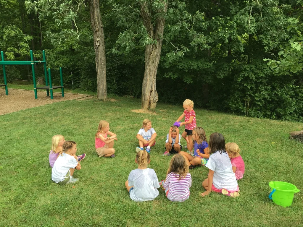 I planned a fun Girl Scout mini-camp for our troop today. We ate sun s'mores, made a photo craft, and played games like “sharks and lifeguards” and “drip drip drench.” (As I type this photo description, I’m wondering how Abby has enough energy to be jumping on the trampoline. I’m wiped out!)