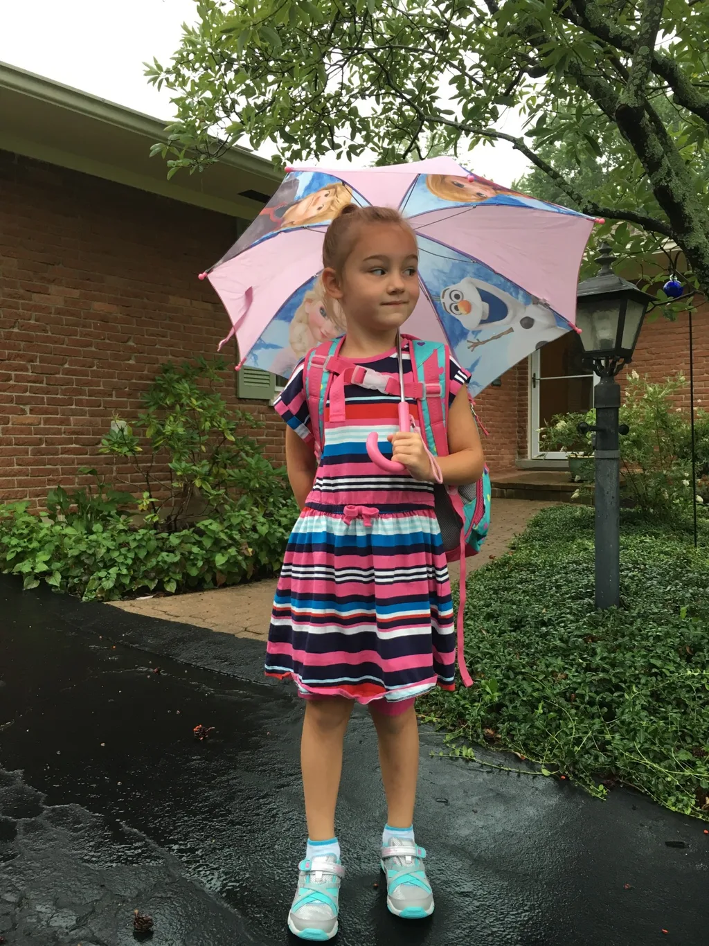 First day of first grade! Even the pouring rain couldn’t put a damper on the excitement at the bus stop this morning.